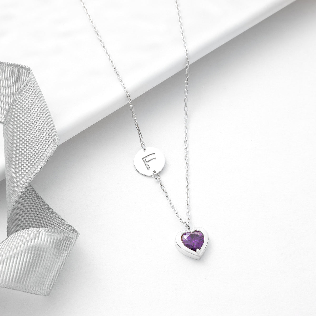 Minimalist initial necklace with birthstone, a personalized jewelry gift