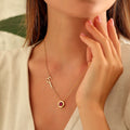 Name necklace with circle birthstone charm, handmade by Artizian