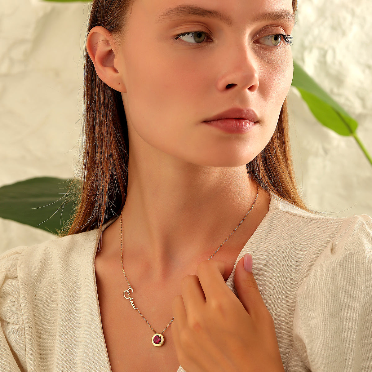 Name necklace with circle birthstone charm, crafted in the Artizian studio