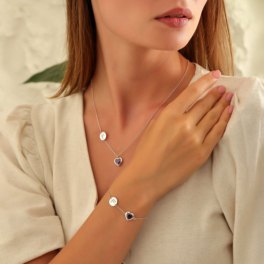 Initial necklace with heart birthstone charm, a personalized jewelry gift