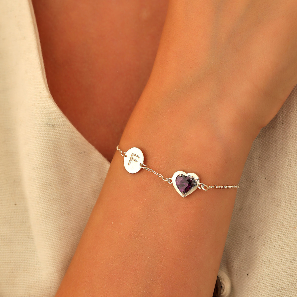 Initial bracelet with heart birthstone charm, handmade by Artizian