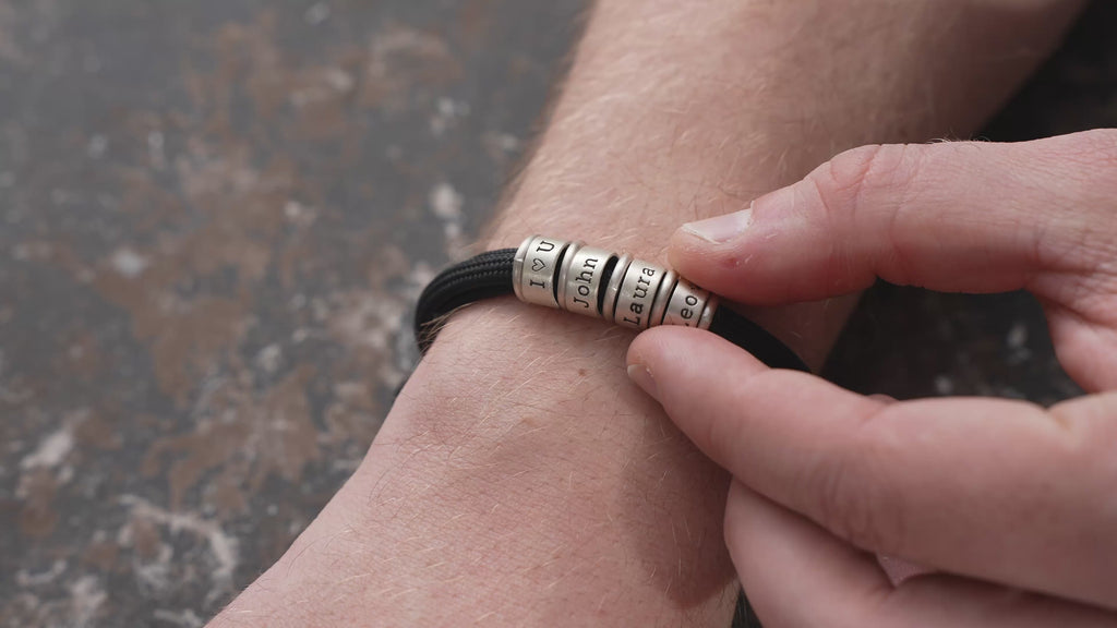 Video of Men's Paracord Bracelet, handmade and engraved by Artizian