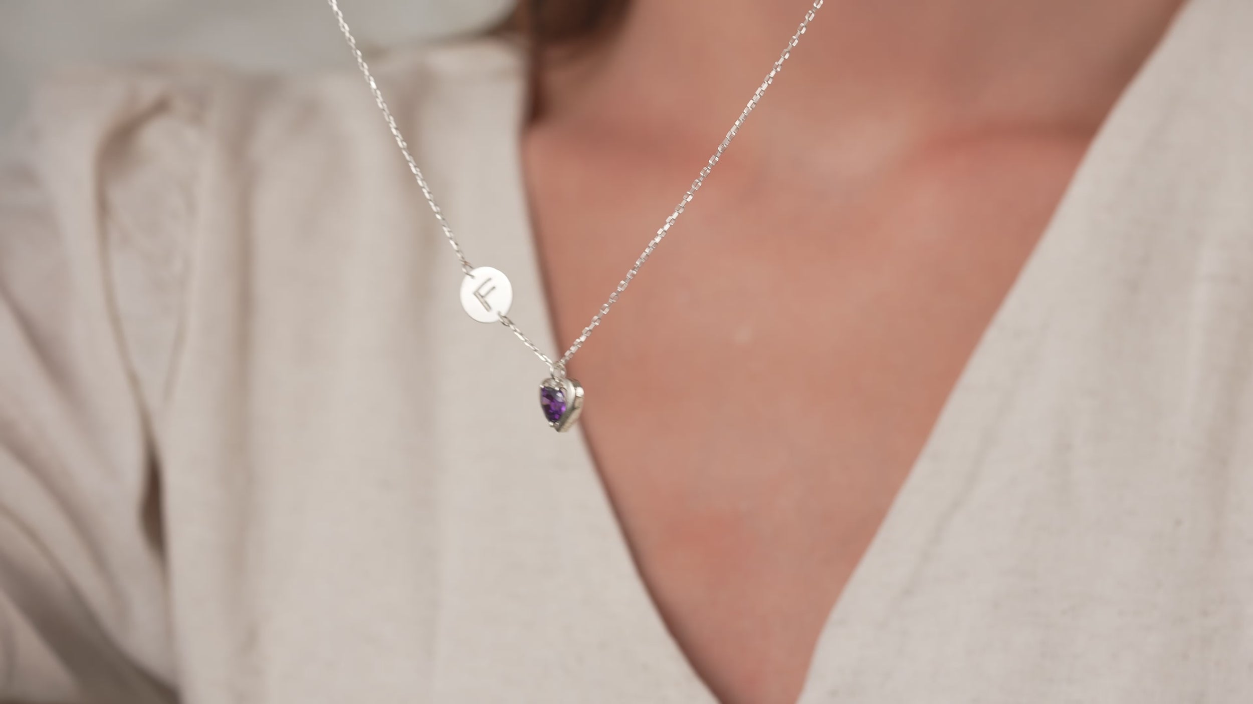 Video of Initial Necklace with Heart Birthstone, handmade and engraved by Artizian