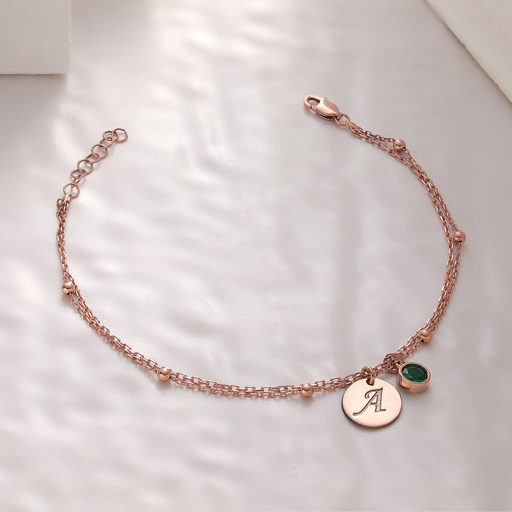 Custom birthstone bracelet with initials, crafted in the Artizian studio